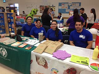 Public health employees at a health event, Mayra Ibarra, Maria Castillo, Laura Apodaca, Jorge Torres