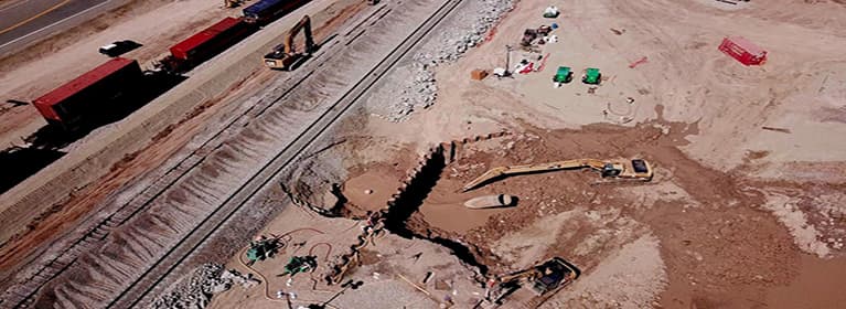 overhead photo of multiple railway systems with geyser shoo-fly implemented on the ride side.